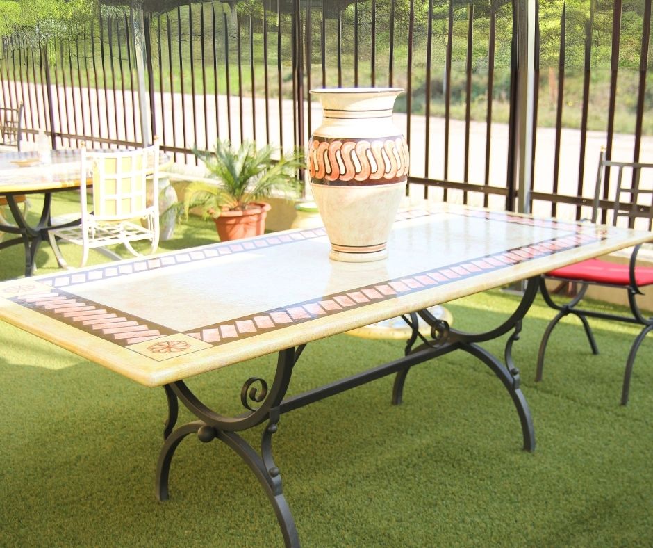 A brick edge design lava stone table. Enamel-glazed and perfect for both outdoor and indoor use.