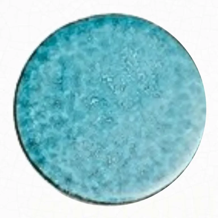 A mono-color lava stone table in emerald hues. Brighten your space with ocean colors!