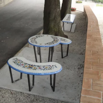 A lava stone set, table, and benches in floral serenity design. Not just elegant urban decor, but a place where beauty and durability merge seamlessly.