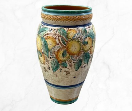 This is a ceramic umbrella stand. Verdeta Bloom Umbrella Stand is the best choice for your entryway.