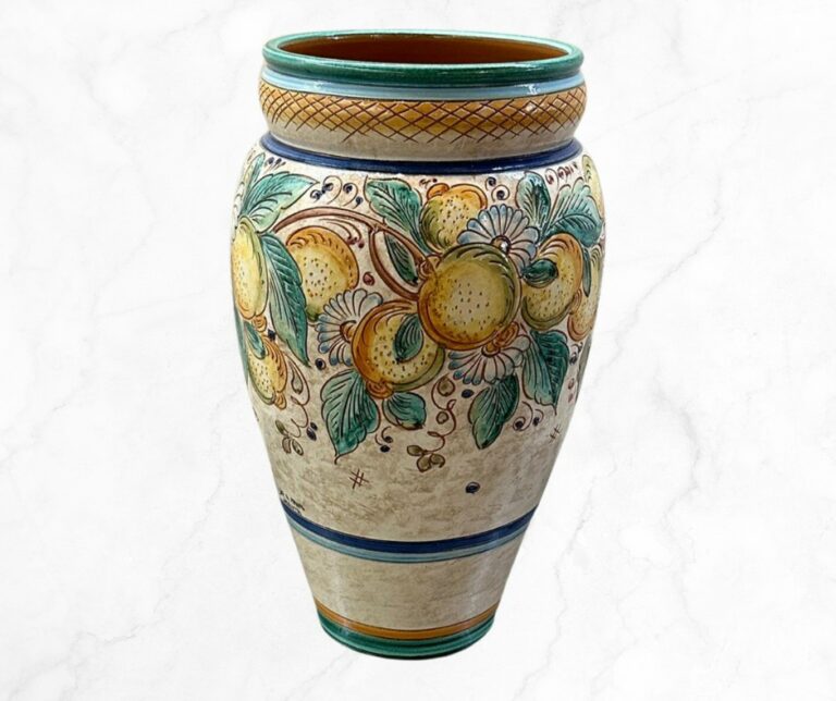 This is a ceramic umbrella stand. Verdeta Bloom Umbrella Stand is the best choice for your entryway.